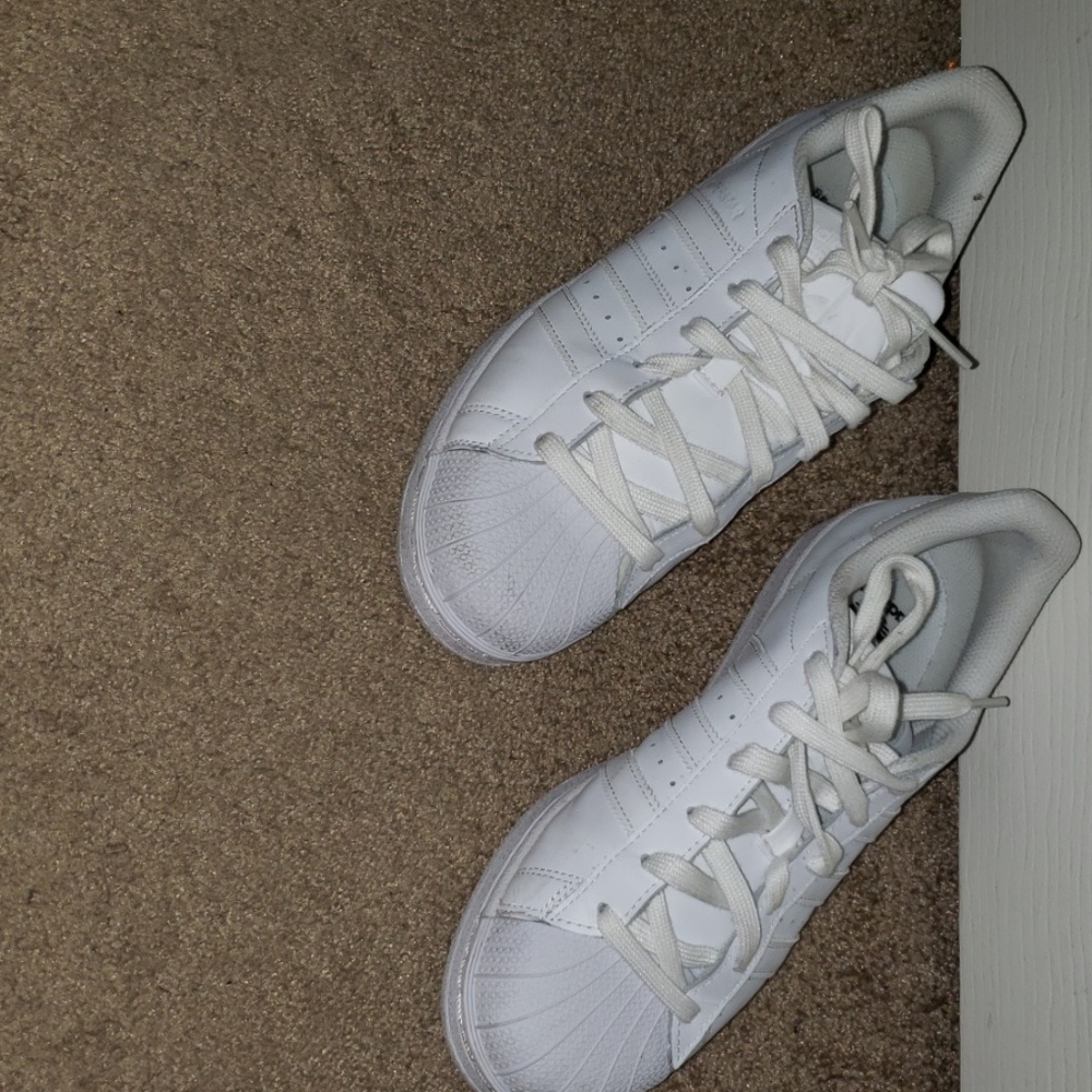 All white worn Adidas